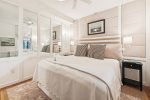Lower level bedroom with queen bed at Ocean Echoes Villa